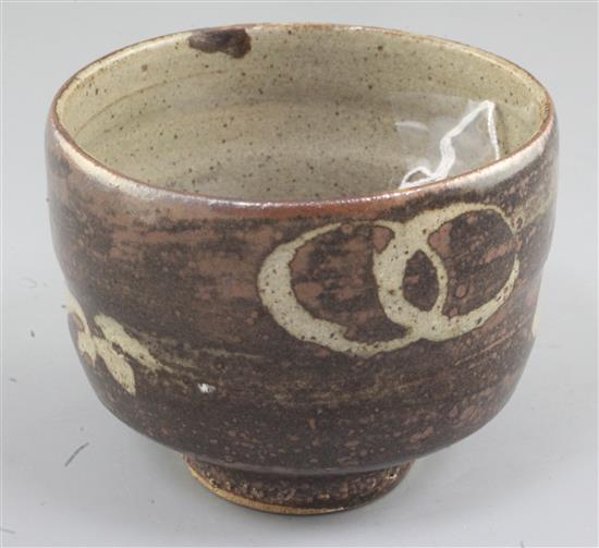 Manner of Shoji Hamada. A Studio pottery cup, diameter 11cm, restored chip